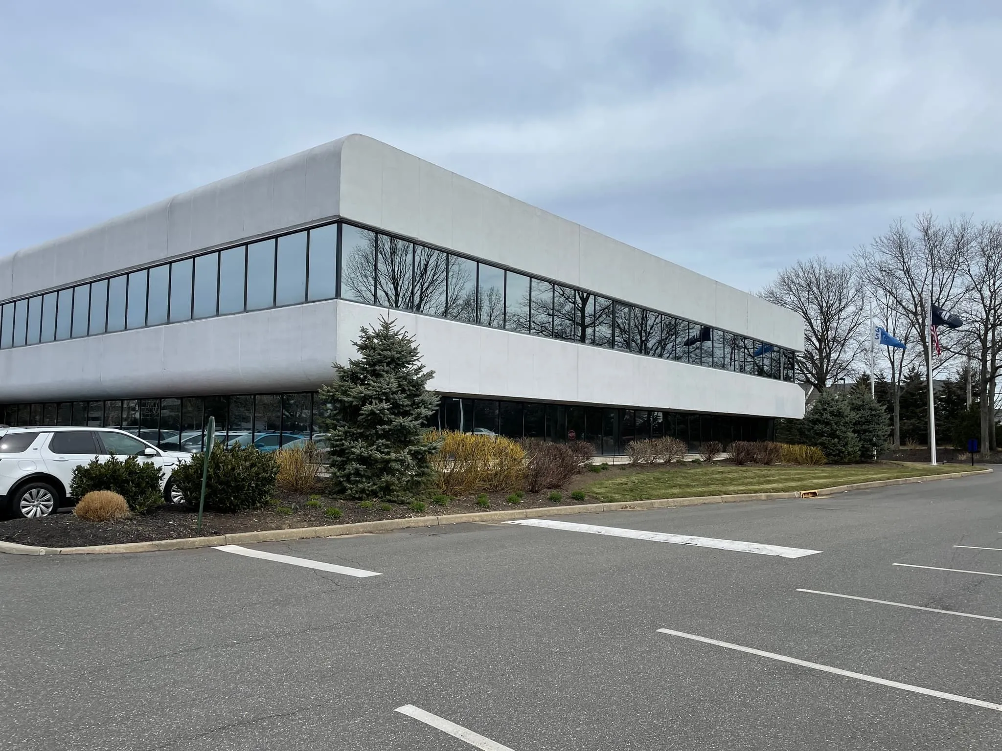 2-Story Melville 118,500 SF Commercial Office Facade Retrofit — Building Overview